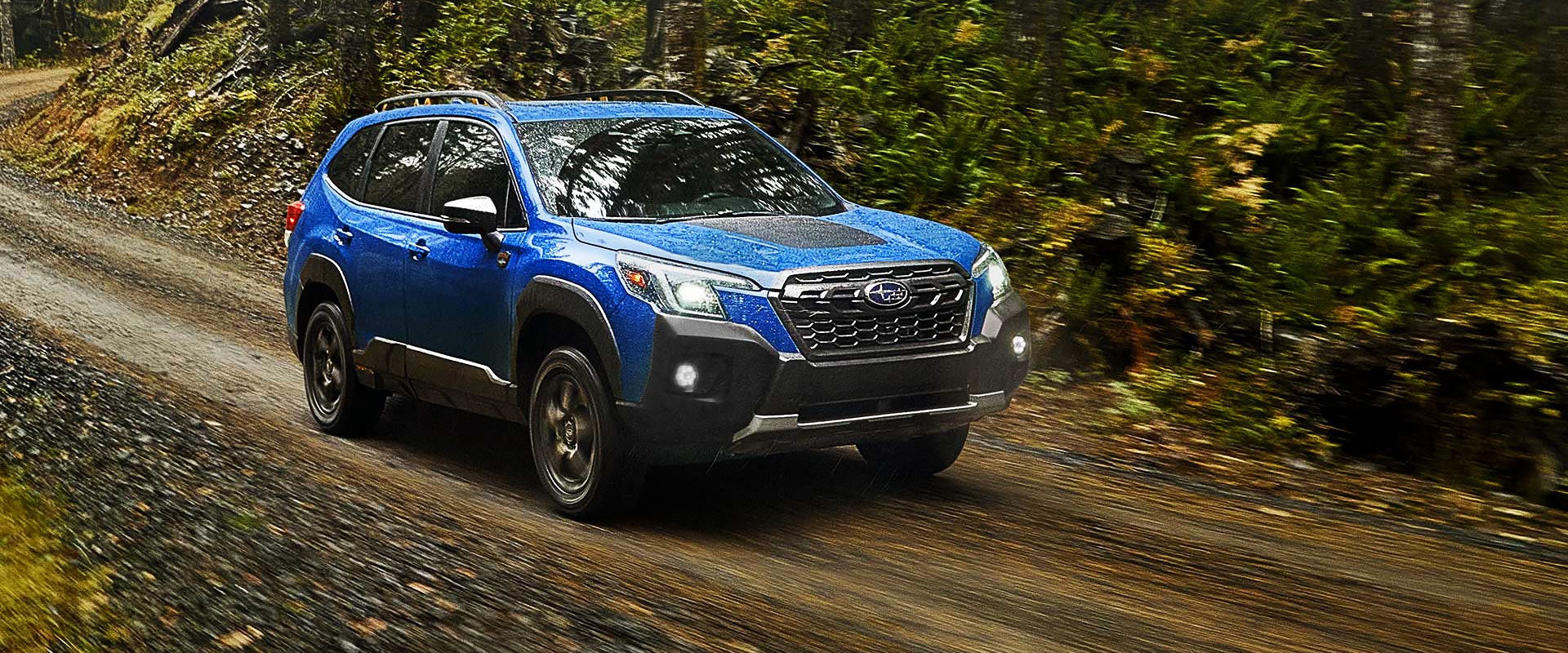 A 2022 Forester driving on a highway. | Dyer Subaru in Vero Beach FL