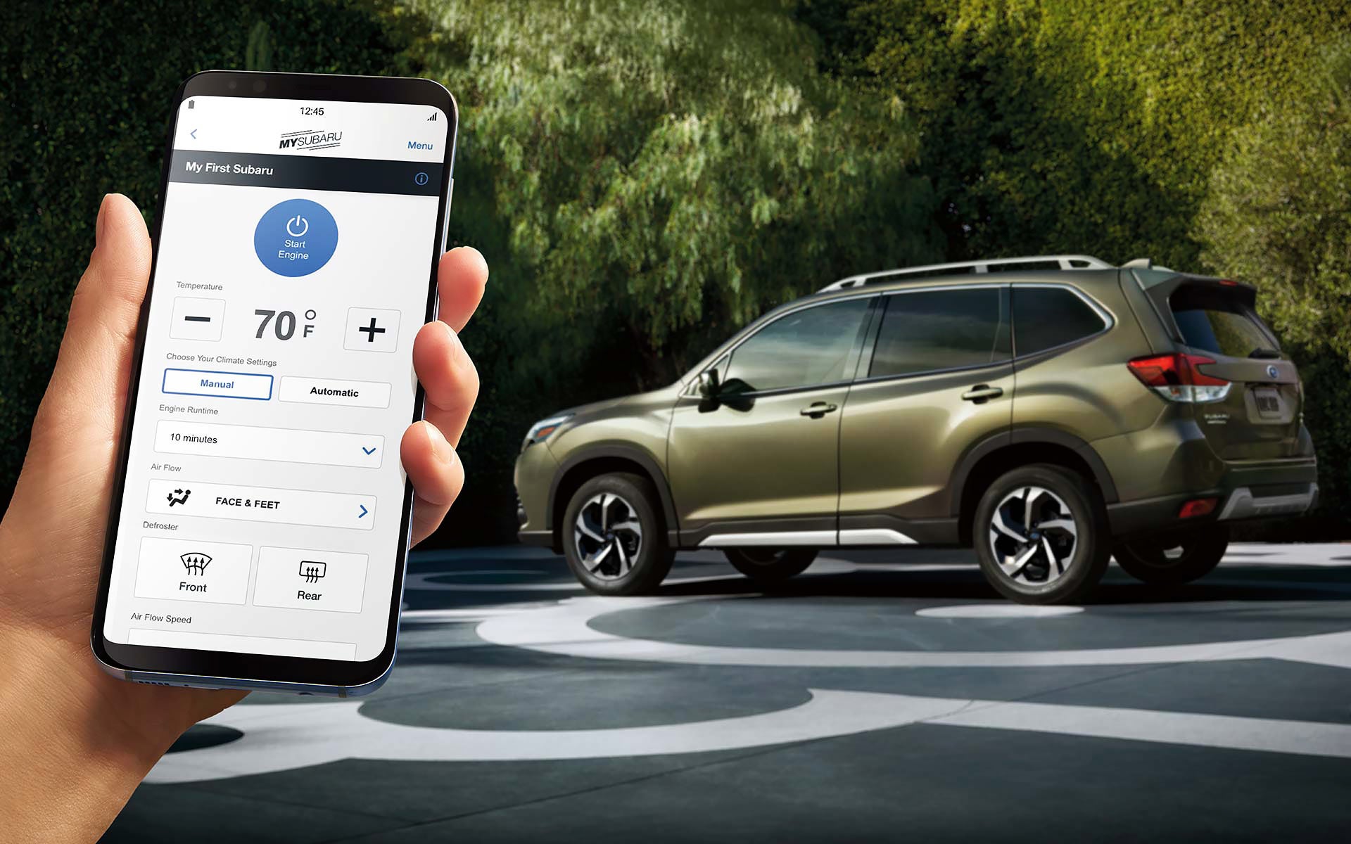 A close-up of a phone showing the Remote Engine Start with Climate Control feature of SUBARU STARLINK® Safety and Security available on the 2022 Forester. | Dyer Subaru in Vero Beach FL